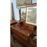 A mahogany dressing chest