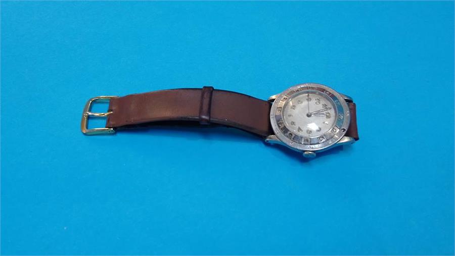 A vintage Movado chronomat wristwatch, rotating