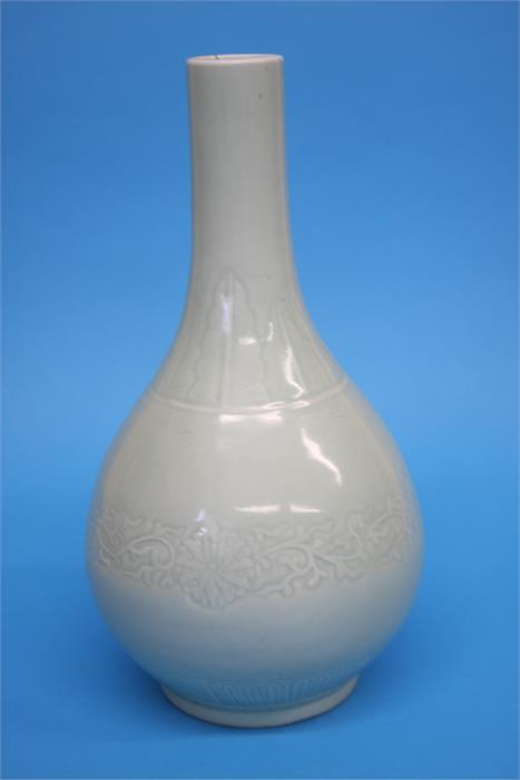 Large Celadon bottle vase, engraved with foliage, seal mark to base, 35cm Height