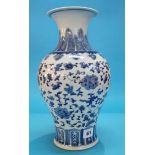 An Oriental blue and white vase