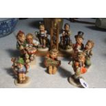 A collection of Hummel figures