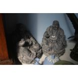 A pair of seated Buddhas