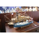 A model paddle steamer and one other