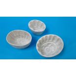 Three jelly moulds