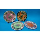 A collection of four Maling lustre plates
