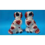 A pair of Staffordshire pot dogs