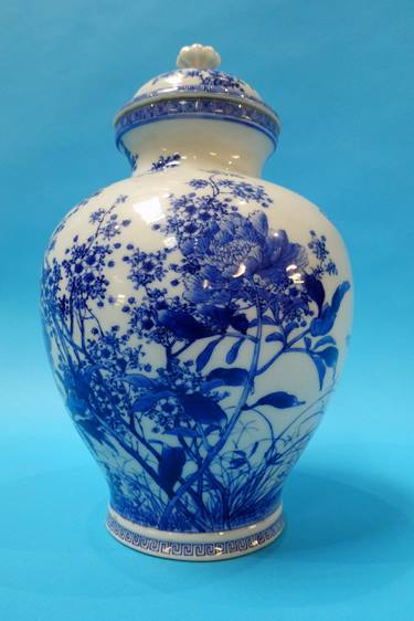 An Oriental lidded vase