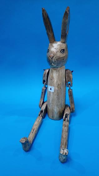 A jointed wooden rabbit