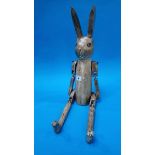 A jointed wooden rabbit