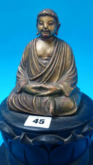 A gilt wood Buddha, resting on carved wood lotus flower 28 cm Height - Image 2 of 4