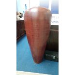 A large terracotta vase