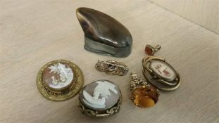 A horn snuff box, two swivel fobs, cameos etc.