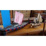 A pair of model boats