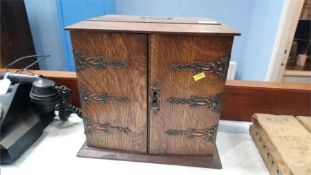 An oak smokers cabinet