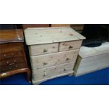 A pine chest of drawers