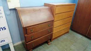 An oak bureau and a chest of drawers