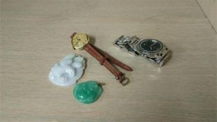 Two Jade pendants, a Herblin watch etc.
