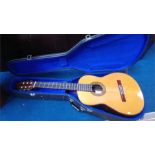 A Spanish guitar and case