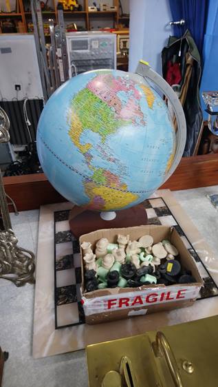 A globe and a chess set
