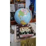 A globe and a chess set