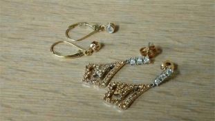 Two pairs of gold and diamond earrings