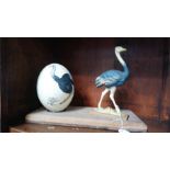 A painted mounted ostrich egg