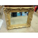 A gilt framed mirror