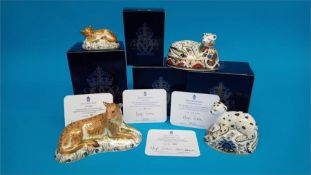 Four Royal Crown Derby paperweights; Leopard cub, 14/1500, the Lion cub, 14/1500, the Sleepy lion