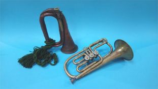 A trumpet by Hawkes and Son and a Flugelhorn with case