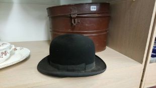Hat box and a bowler hat