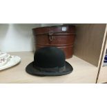 Hat box and a bowler hat