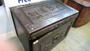 Carved oak cabinet with single drawer