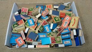 Collection of match boxes containing watch parts
