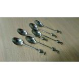 A set of six silver spoons