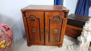 Oak smokers cabinet in the form of a Safe