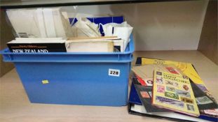 Box of various stamps and stamp collecting books
