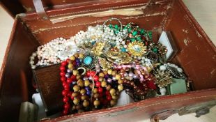 Quantity of costume jewellery in one case