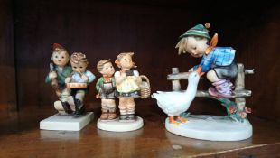 Three Hummel figures