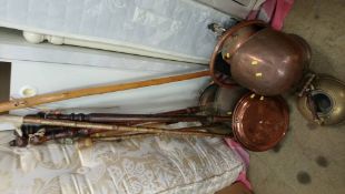 Three warming pans and copper scuttle etc.