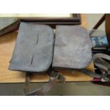 Two leather pouches and two boats
