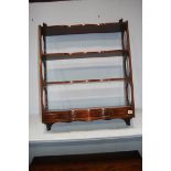 A set of reproduction mahogany wall shelves