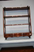 A set of reproduction mahogany wall shelves