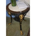 A cast iron pub table by 'Masons Prize Bar Fitting