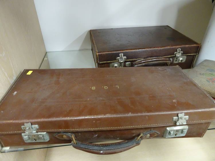 Enamel bread bin and two suitcases