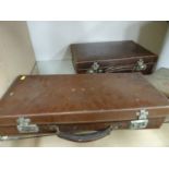 Enamel bread bin and two suitcases