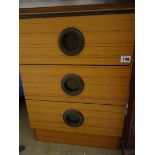 Lloyd Loom basket and a bedside chest