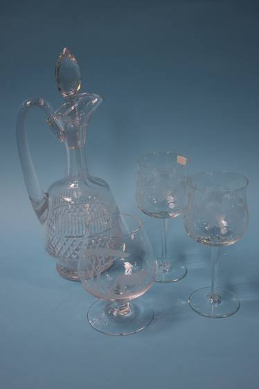 Six etched wine glasses, a Rowland Ward whisky tum