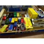 Quantity of die cast toys in three boxes