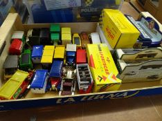 Quantity of die cast toys in three boxes