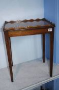 A small pair of mahogany occasional tables